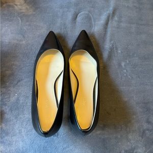Nine West Black pumps.